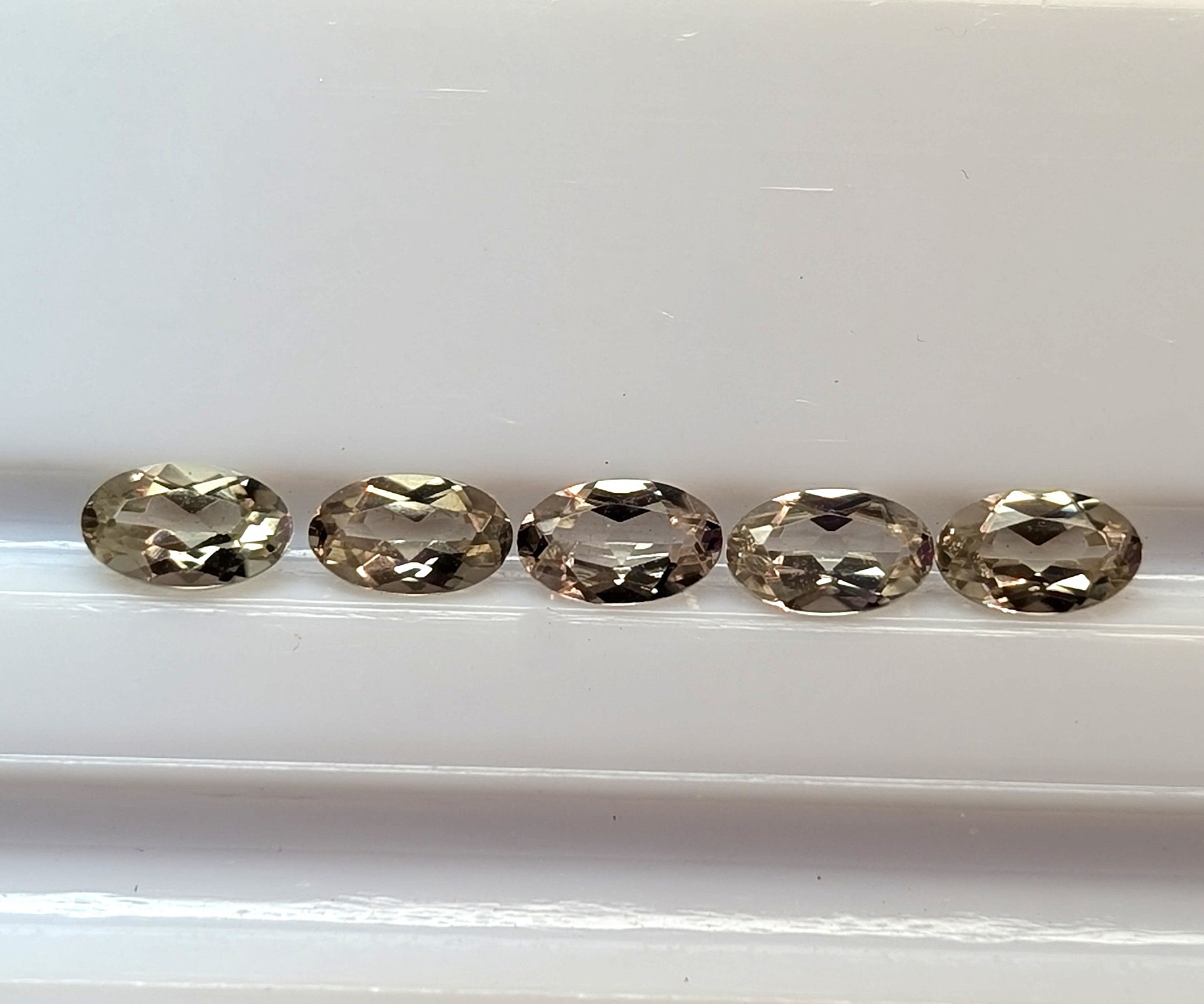Color-Change Zultanite® Oval Cut, 5x3mm, Set of 5, cttw. 1.19 carats.
