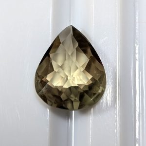 Zultanite® Lentil Pear Shape Checkerboard Cut Gemstone, 6.60 carats, MI = Moderately Included.