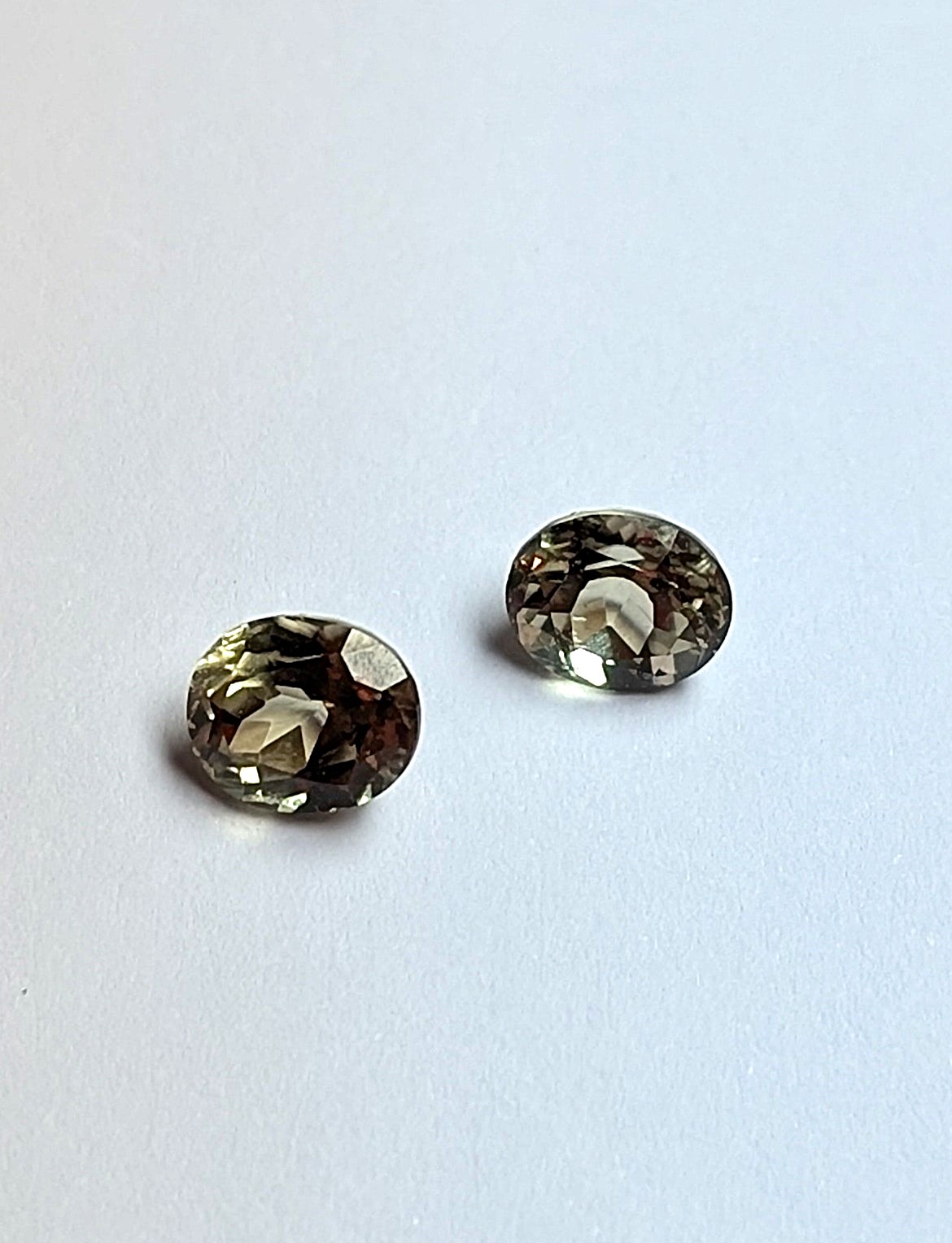 Zultanite® Oval Cut Gemstone, PAIR (2 pieces), 7 mm x 6 mm, total weight 2.77 carats, EC = Eye Clean (flawless).